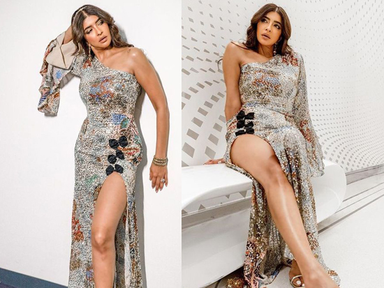 Titillating Poses Of Manchu Lakshmi In Thigh Slit Outfit